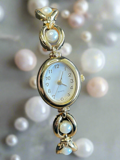 Avon SR626SW Gold Tone and Faux Pearls Women Quartz Movement Dainty Wrist Watch