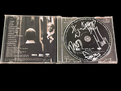 Autographed Korn "Life is Peachy" Album Booklet and CD