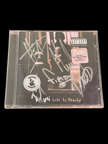 Autographed Korn "Life is Peachy" Album Booklet and CD