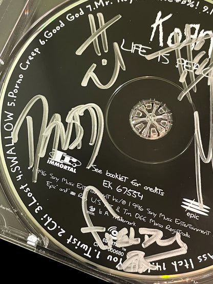 Autographed Korn "Life is Peachy" Album Booklet and CD