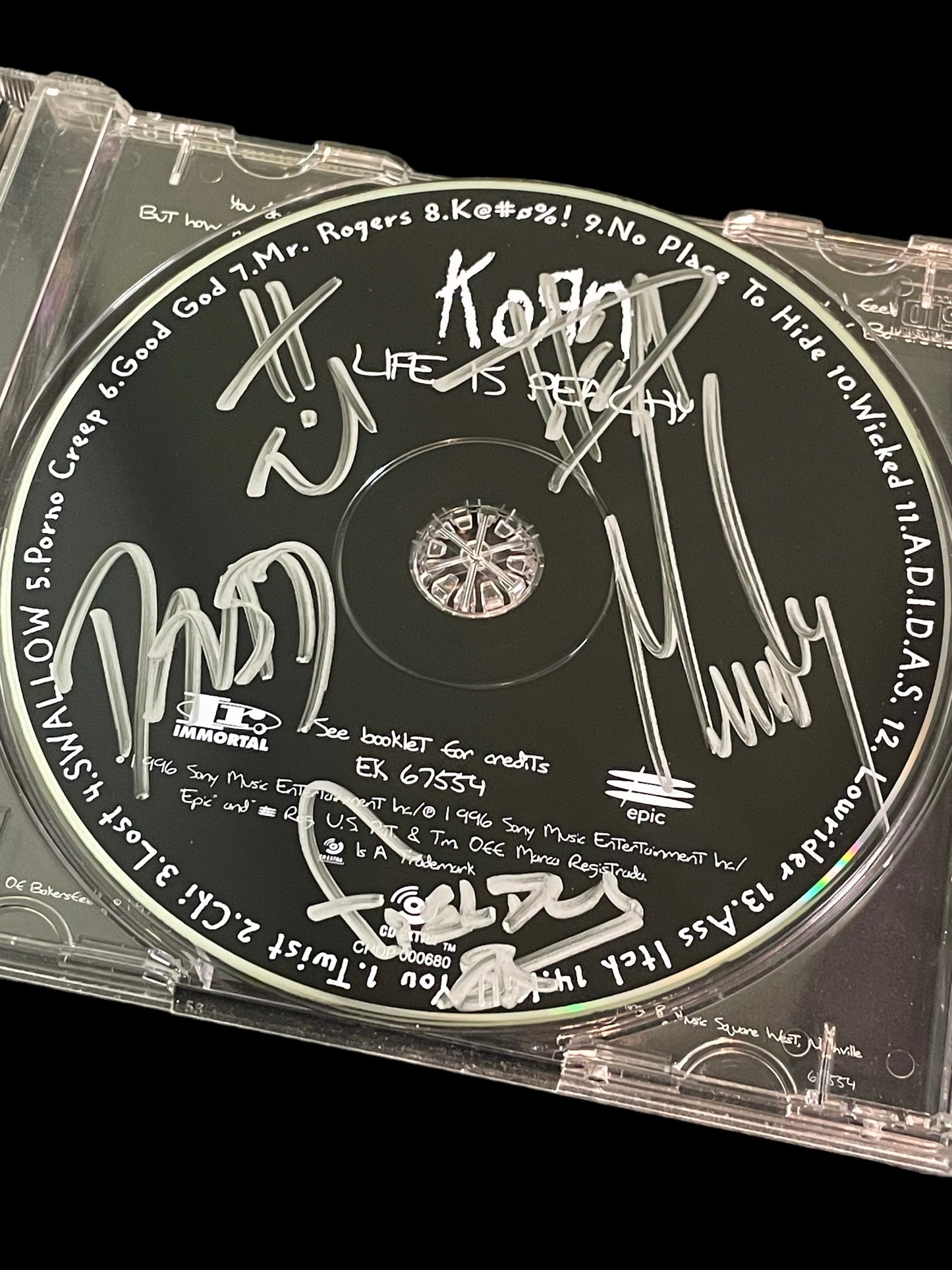 Autographed Korn "Life is Peachy" Album Booklet and CD