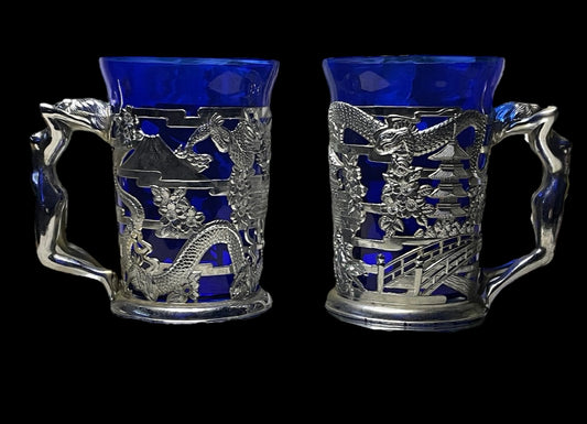 Pair of Mid Century Blue and Silver/Chrome Oriental Style and Nude Woman Mug